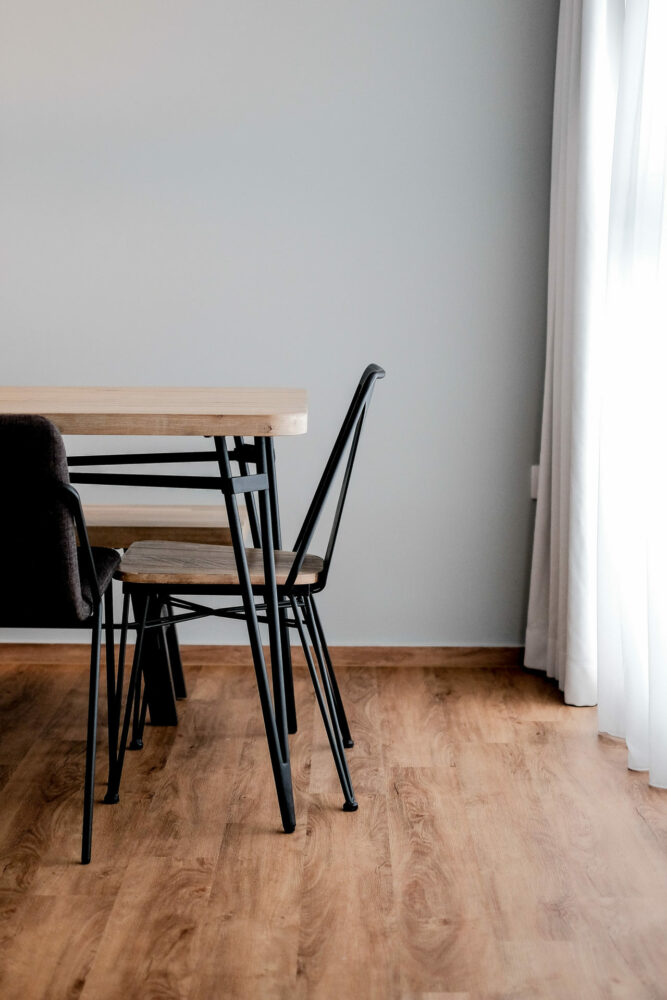 The dark furniture pieces complement the different hues of the woodwork. For more information, click here.