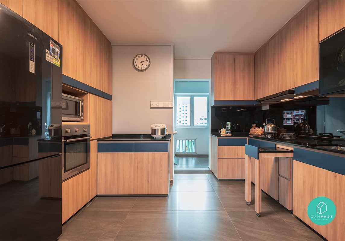 Storage cabinets and a customised pull-out countertop in the kitchen