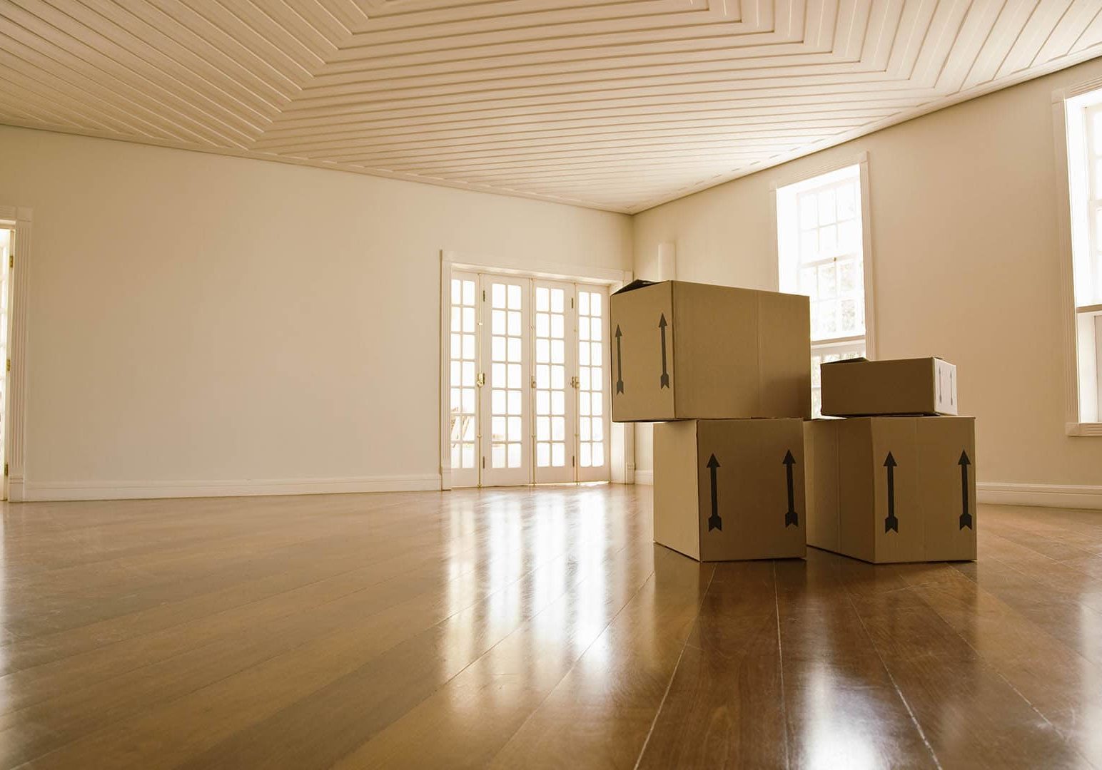 Moving boxes in empty room