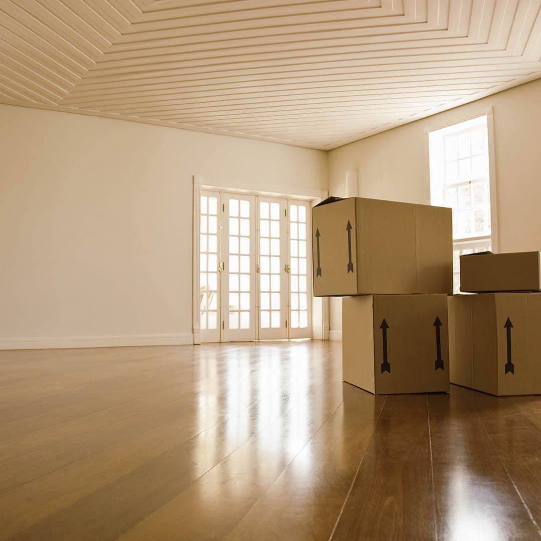 Moving boxes in empty room